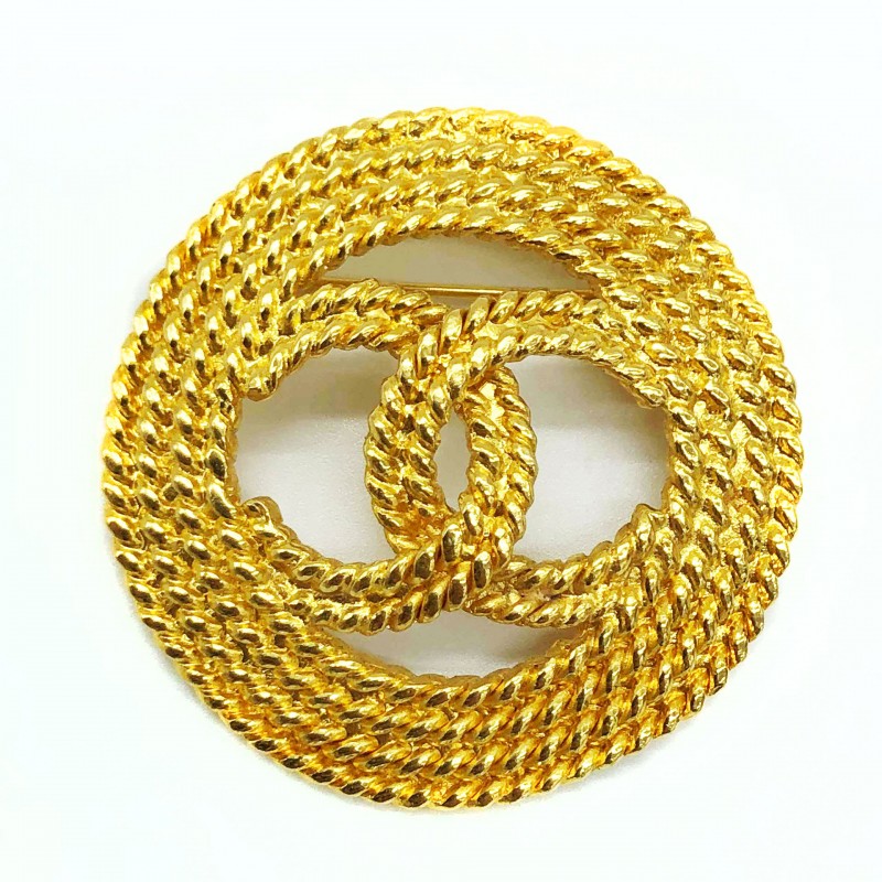 Broche Chanel doré double CC